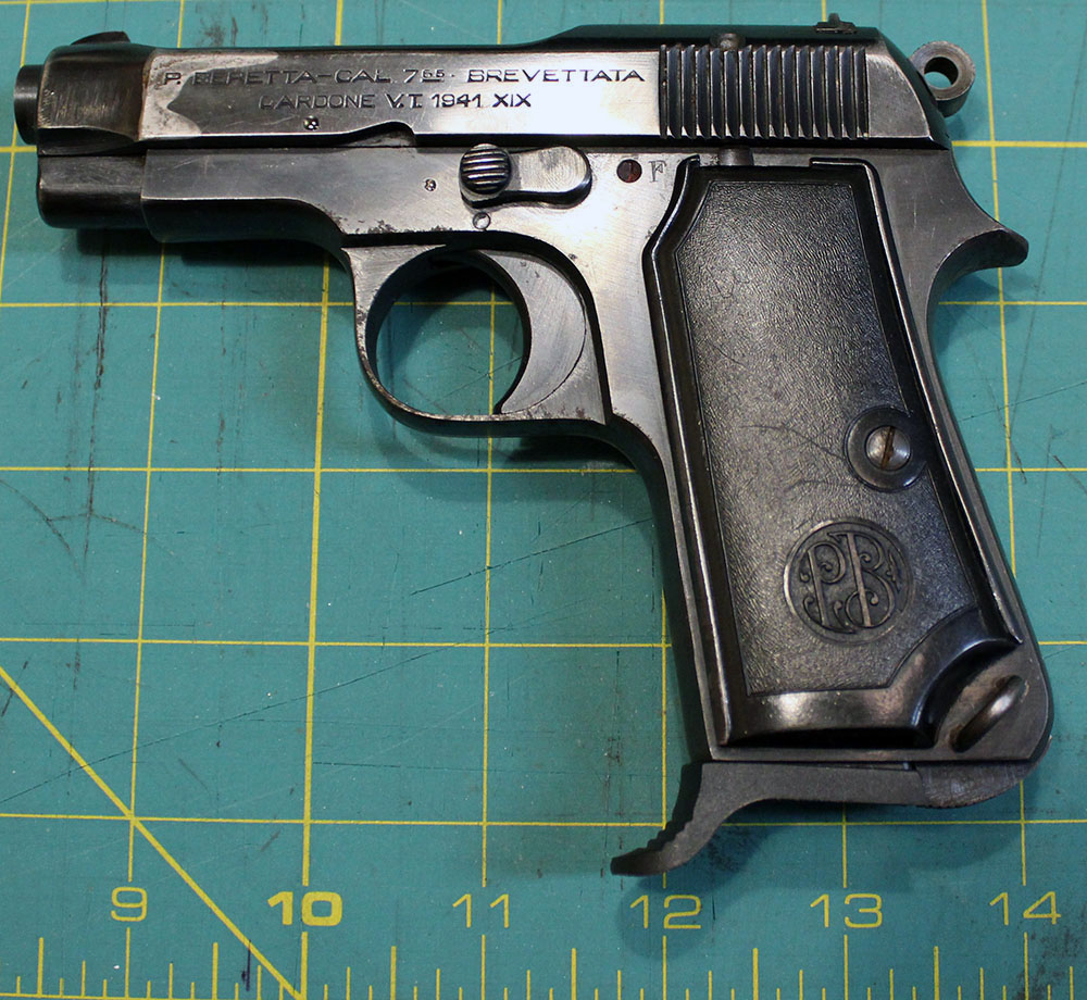 Beretta M1935, left side, on a crafting mat